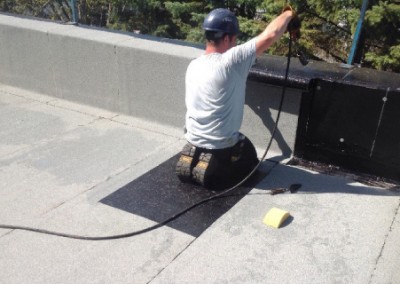 Toiture en membrane élastomère EPDM et TPO à Laval sur toit plat / Réparation Toiture Montréal